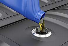 Automotive fluid being poured into a automotive system.