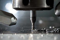 Close up photo of CNC Milling equipment during operation