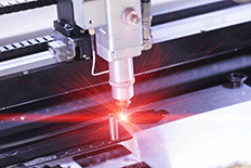 Close up of engraver laser cutter equipment during operation