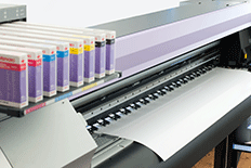 Color image of a large format printer with several ink cartridges