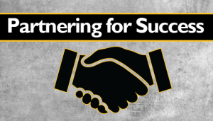 Icon of two people shaking hands with the text partnering for success