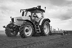 First Western Equipment Finance - Black and White Photo of Agricultural Plow Equipment